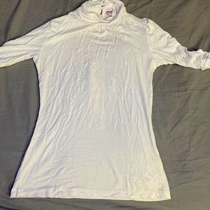 A white Authentic Guess Blouse in Mint Condition